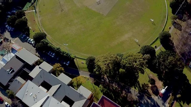 Aerial Tilt to reveal University Field