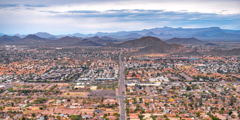 Downtown Arizona with mountains and cloudy sky