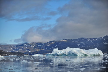 Icebergs are huge mountains of ice, a breakaway from a glacier and drifting in the sea or ocean.