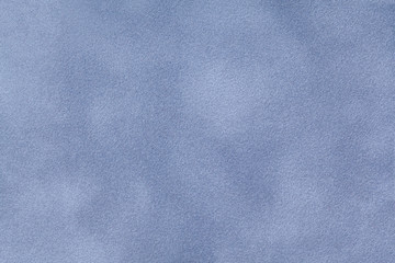 Light blue matt suede fabric closeup. Velvet texture.