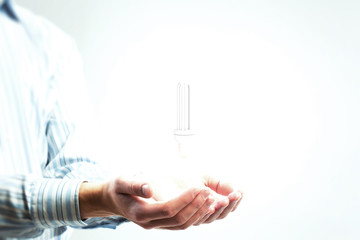 Glass bulb in hands