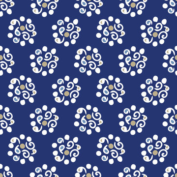 Decorative abstract floral dot pattern in gold and off white on a dark blue background. Seamless vector pattern good for textiles, fashion, home decor, gift wrapping paper, invitations and wallpaper.