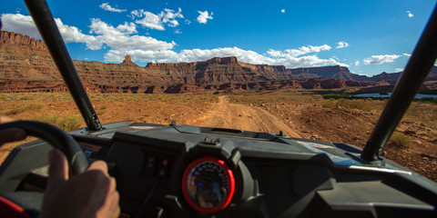 Off road trail in Moab with view of sheer cliffs