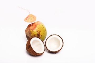 Broken coconut and green coconut isolated on white background