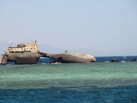 Cargo ship wreck on sandbank in the red sea