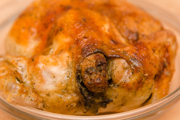 Fried chicken lies on a plate. Fried chicken with spices.