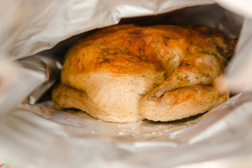 Fried chicken lies on a plate. Fried chicken with spices.