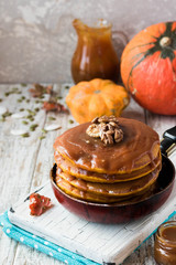 Spicy pumpkin pancakes with salted caramel topping