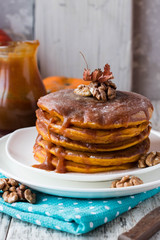 Spicy pumpkin pancakes with salted caramel topping