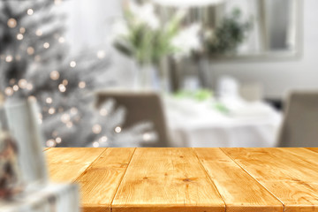 Old wooden table in. Christmas evening and magical time  