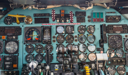 Old analog cockpit of an airliner airplane 
