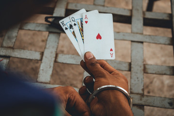 Playing cards in hand