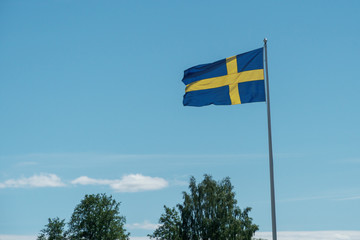 flag on blue sky background