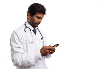 Side-view of doctor looking at phone screen.