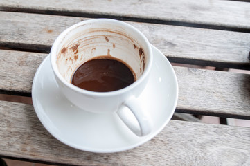 Top view of a cup of coffee isolated on white background
