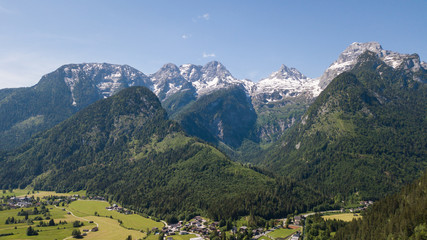 Fototapeta na wymiar Aerial view of mountain range with snow in the alpine mountains