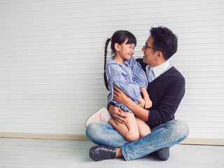 Fototapeta na wymiar happy family with father and child playing together