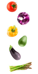 Fresh flying vegetables ingredients isolated on a white background.