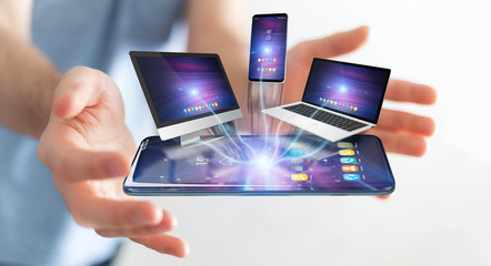 Modern devices connected in businessman hand 3D rendering