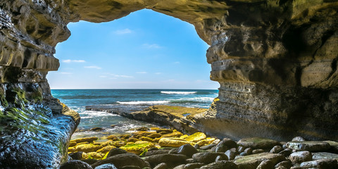 Sea cave in La Jolla overlooking Pacific Ocean - Powered by Adobe