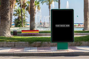 Outdoor billboard advertisement in seaside resort city mockup © sdecoret