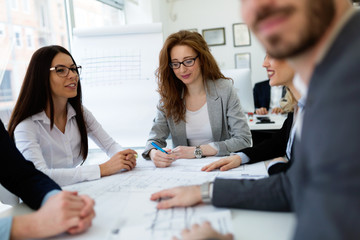 Group of architects working together on project