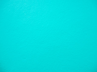 Abstract colorful light blue painted cement wall texture and background