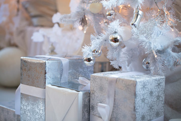 Christmas  background in white with white Christmas tree. closeup shot. blurred background