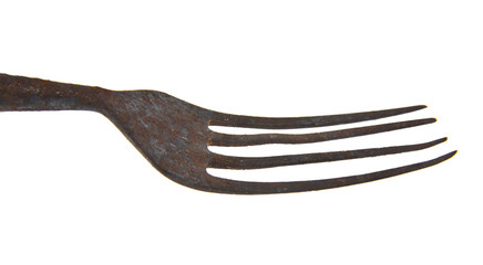 metal rusty old fork isolated on white background