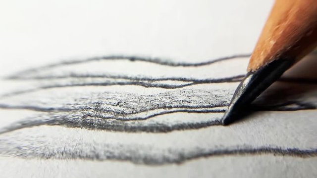 The Pencil Draws Uneven Random Lines on a White Paper. Macro Close Up Time Lapse.