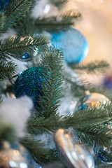 Christmas tree in interior. Christmas background. closeup shot. blurred background