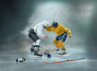 Caucasian ice hockey Players in dynamic action in a professional