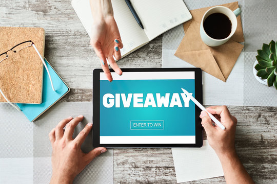 Giveaway, enter to win text on screen. Lottery and prizes. Social media marketing and advertising concept.