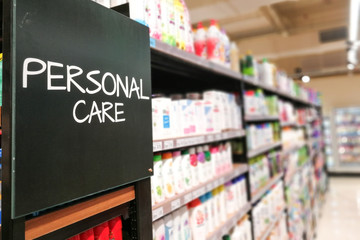 Personal care household grocery categoy aisle at supermarket - obrazy, fototapety, plakaty