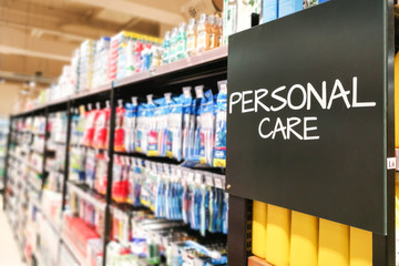 Personal care household grocery categoy aisle at supermarket