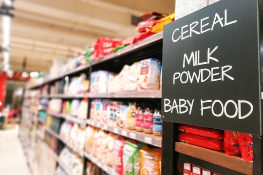 Cereal, milk powder, baby food grocery categoy aisle at supermarket