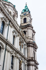 Fototapeta premium Fragment of Church of Saint Nicholas. Baroque church in Mala Strana district of Prague. Czech Republic