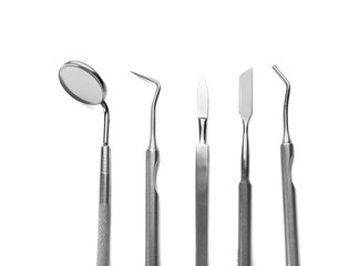 Dentist's tools on white background