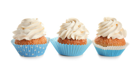 Delicious cupcakes on white background