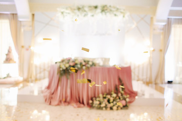 Floral decoration on the wedding table in restaurant