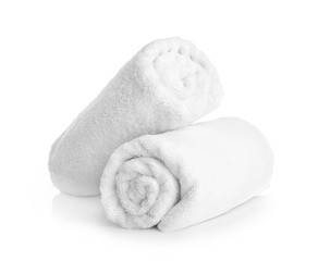 Fototapeta na wymiar Clean rolled towels on white background