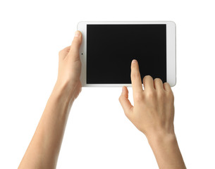 Young woman using tablet PC on white background