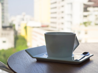 hot coco cup on wood table, hot chocolate milk in the morning.