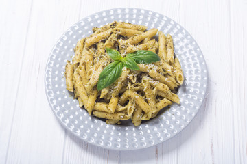 Italian penne pasta with sauce pesto
