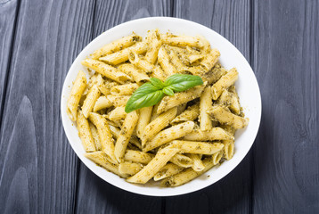 Italian penne pasta with sauce pesto