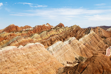 Striped rock formations in Danxia Feng, or Colored Rainbow Mountains, in Zhangye, Gansu, China. Here the view from the Sea of Clouds observation deck