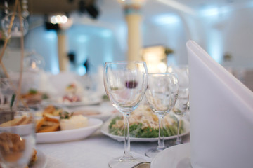 Glasses on the table in restaurnt. Wedding decor