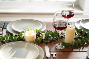 Glasses of wine on table set in restaurant