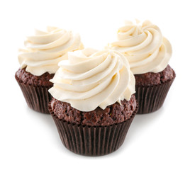 Tasty chocolate cupcakes on white background