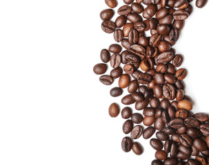 Roasted coffee beans on white background